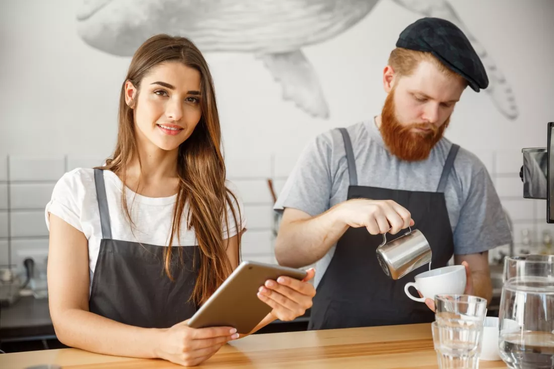 Students working a summer job in a café