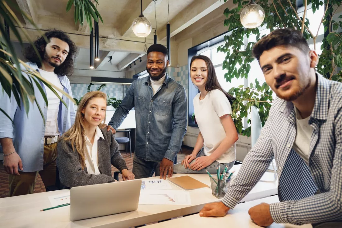 A young international team in an office